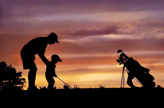 A Father Teaching His Son to Golf - Photo courtesy of &copy;iStockphoto.com/JLBarranco, Image #7322238
